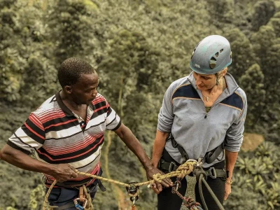 Instructor Backson giving abseiling instructions before descending